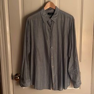Light blue stripped woman’s button down.